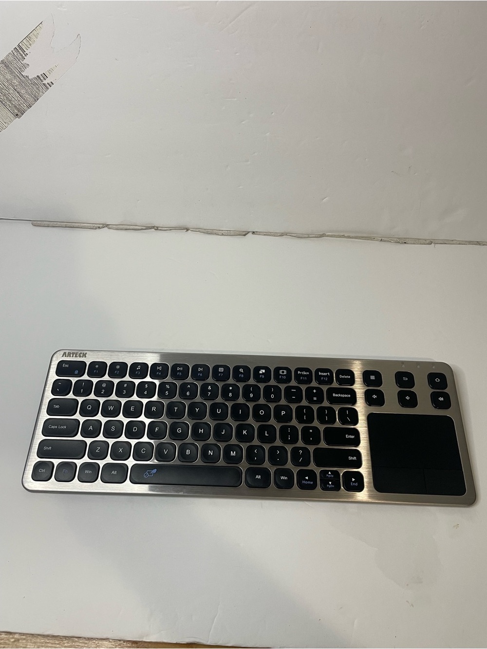 Arteck Wireless Slim Keyboard with Touchpad - Silver and Black